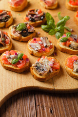 Mix Bruschetta with sardines and anchovies.