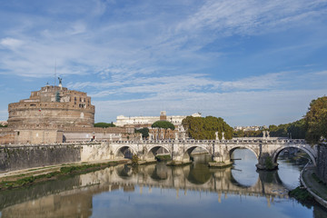 View of the bridge over the Tiber and the fortress of Santangelo against the blue sky