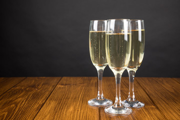 champagne glass on a wooden background