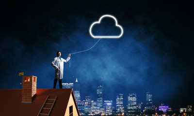 Conceptual image of doctor with cloud symbol