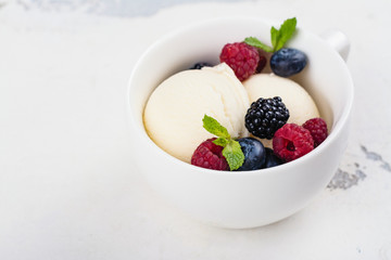 Vanilla ice cream with berries