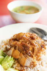 Crispy pork over rice with sweet gravy sauce
