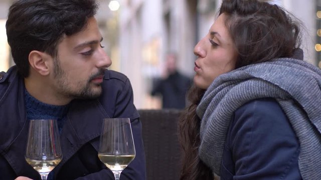 love,flirt,jokes. Two lovers eating and joking - outdoor