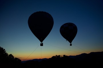 Hot air balloon against the evening sky at sunset