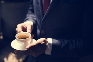 A businessman having coffee