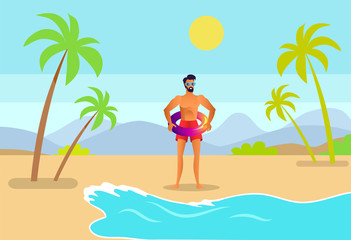 Obraz na płótnie Canvas Man in Trunks with Inflatable Ring on Tropic Beach