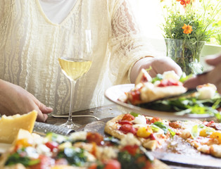 Woman enjoying a pizza dinner