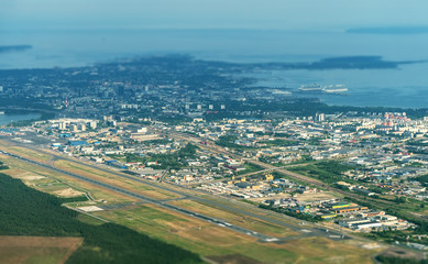 Fototapeta na wymiar View from the plane to Tallinn airport and Lasnamae district.
