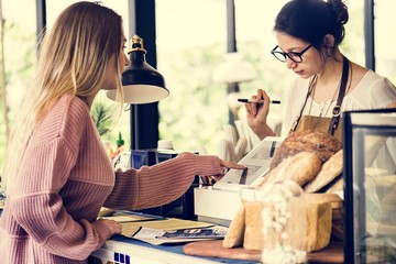 Customer ordering pasrty at counter
