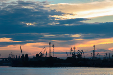 Fototapeta na wymiar Huge sea cranes in port of Varna