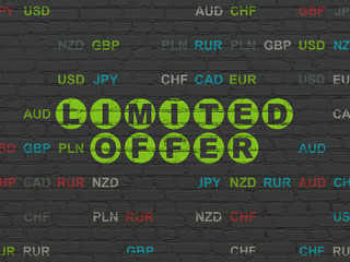 Business concept: Painted green text Limited Offer on Black Brick wall background with Currency