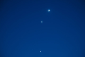 Naklejka na ściany i meble Conjuction of Moon, Venus and Mercury as seen from the southern part of Earth.