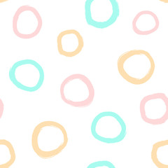 Repeated circles drawn with watercolour brush. Simple geometric seamless pattern for children. Grunge, sketch, watercolor.