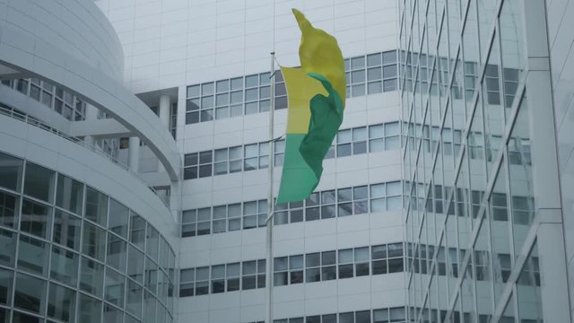 The flag of The Hague at the city hall. Shot in sixty frames per second variable frame rate.