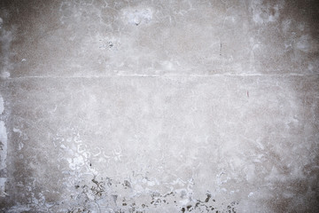 Damaged grey concrete wall exterior background texture