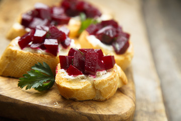 Homemade cream cheese and beetroot crostini