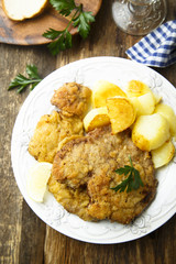 Classic homemade schnitzel with potato