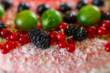 Delicious healthy vegetarian food, do not bake a strawberry cheesecake, decorated with fresh red berries and green mint leaves. Copy space