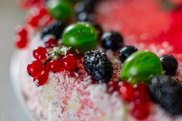 Delicious healthy vegetarian food, do not bake a strawberry cheesecake, decorated with fresh red berries and green mint leaves. Copy space