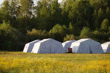 white large army tents. rescue camp.