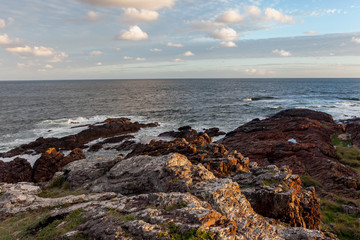 Coastal rocky shore at sunset