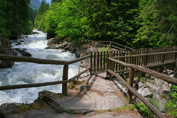 Wooden bridge in Parco Naturale Adamello Brenta near Pinzolo in South Tyrol in Italy

