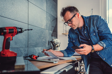 Architect using smart phone