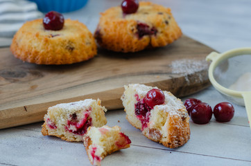 Slices of fresh iced sponge cake with cherries