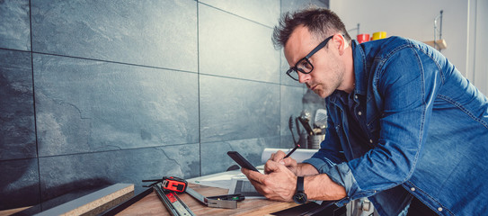 Architect using smart phone