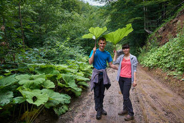 Young couple hiking on a trail