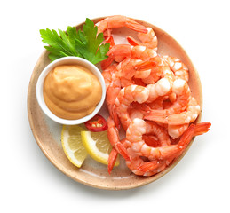 plate of boiled prawns and salsa sauce