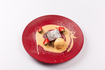 Front and Top View - Sweet Desert - Brownie with vanilla sauce.