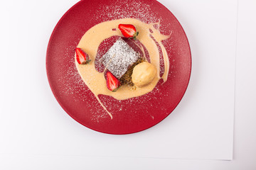 Front and Top View - Sweet Desert - Brownie with vanilla sauce.