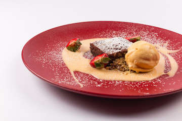 Front and Top View - Sweet Desert - Brownie with vanilla sauce.