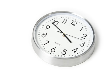 Modern wall clock on white background.