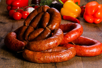 Pork sausages over wooden