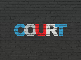 Law concept: Painted multicolor text Court on Black Brick wall background