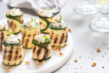 Grilled zucchini rolls stuffed with cream cheese