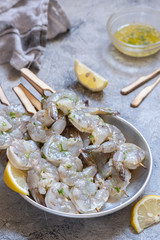 Raw Shrimps on Wooden Skewers