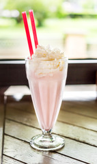 Milk cocktail on the table at the cafe.