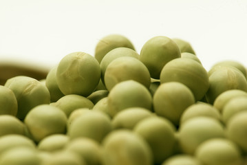 Green peas on white background 