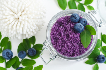 Homemade blueberry sugar scrub/bath salts/foot soak in a glass jar. DIY cosmetics for natural skin...
