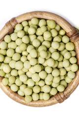 Green peas in cane basket isolated on white background