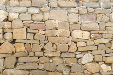 orange wall of a wild stone close up