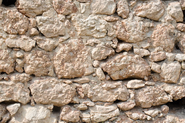 orange wall of a wild stone close up