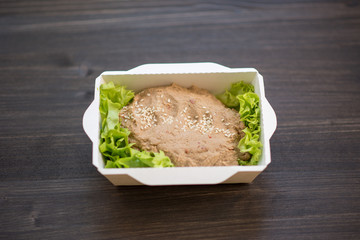 photo of a real meal on a dark background