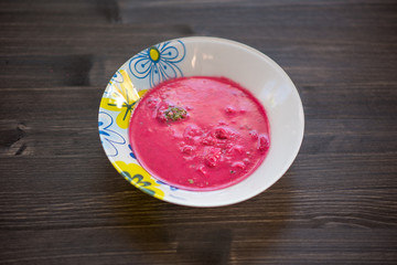photo of a real meal on a dark background on a white plate.