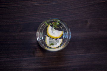 photo of a drink in a transparent glass on a dark background