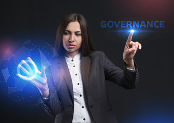 The concept of business, technology, the Internet and the network. A young entrepreneur working on a virtual screen of the future and sees the inscription: Governance