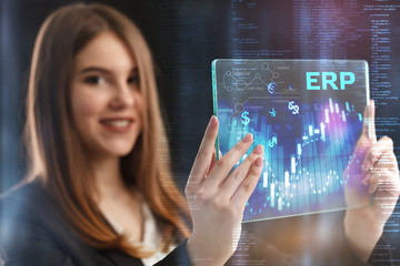 The concept of business, technology, the Internet and the network. A young entrepreneur working on...
